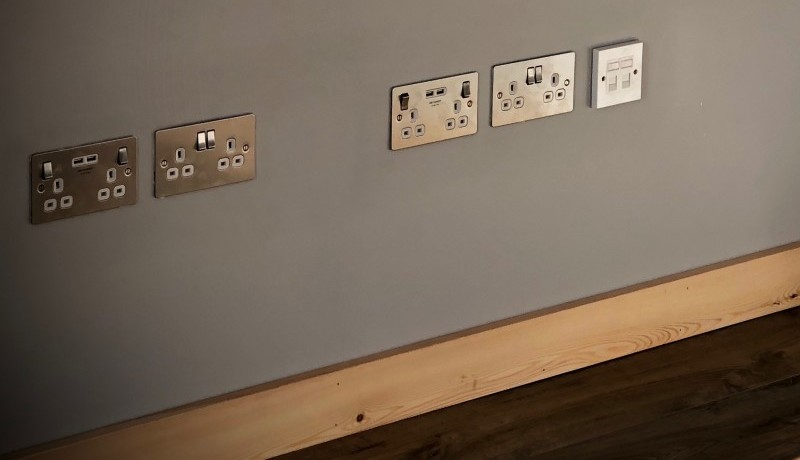 Plugs with USB ports