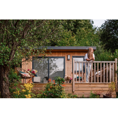 UNO Max Garden Room with extended timber decking and balustrade