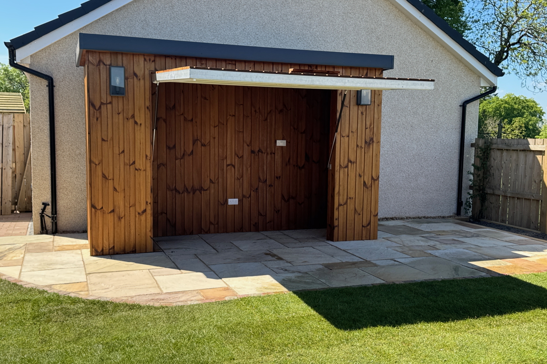 Outdoor Kitchen clad in Thermowood with hinged door