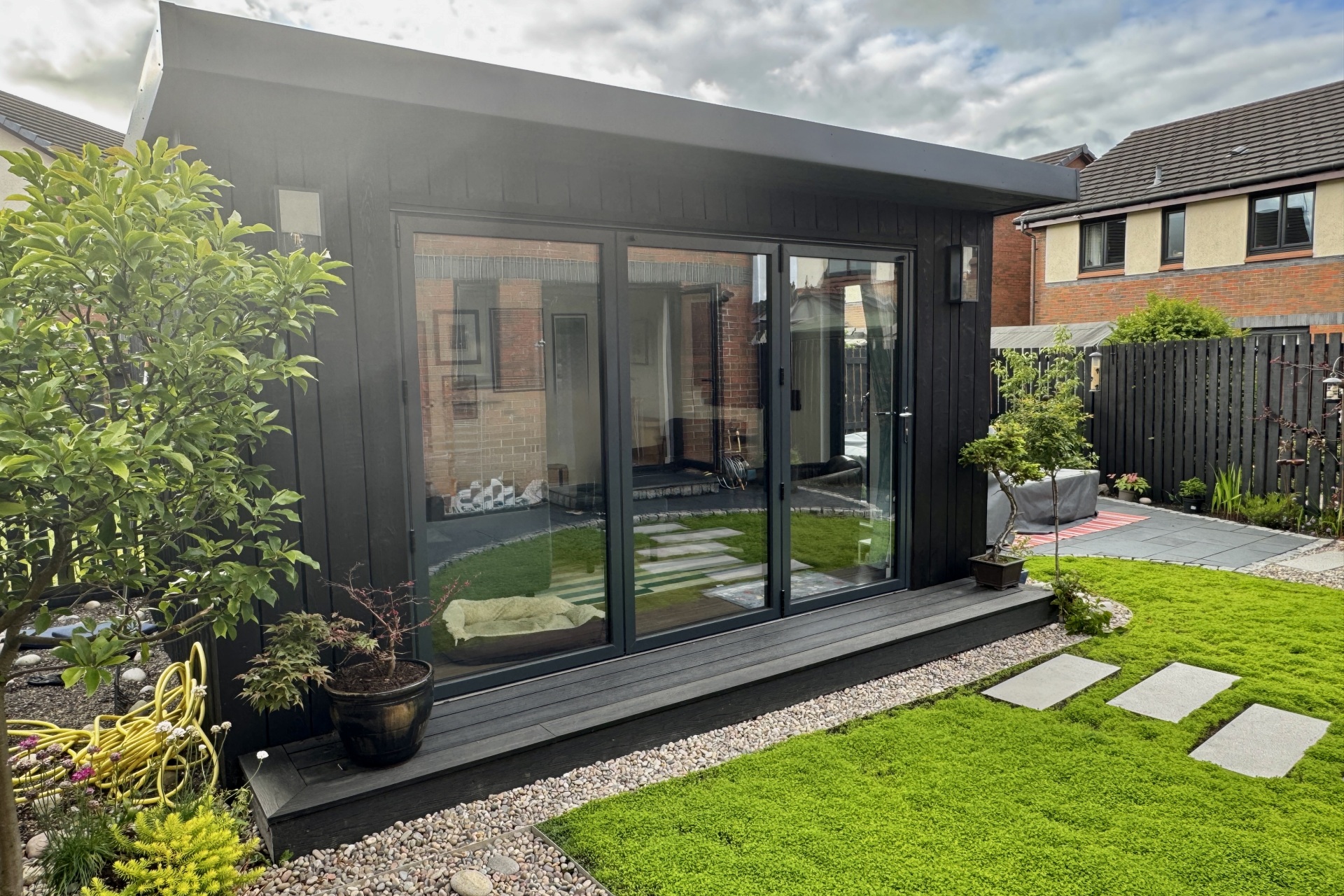 UNO Midi Garden Room with IRO Cladding and bi folding doors