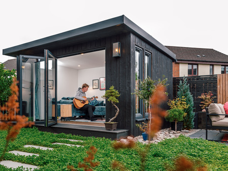 UNO Midi Garden Room with bifold doors and IRO Charcoal cladding